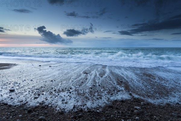 Atlantic ocean beach at dusk, Normandy, France, Europe
