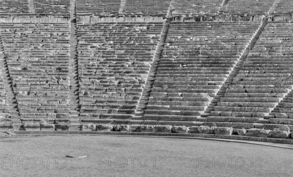 Epidauros, Greece, 9 November, 2022: architectural detail of the stone rows and seats in the Ancient Theatre of Epidauros in southern Greece, Europe