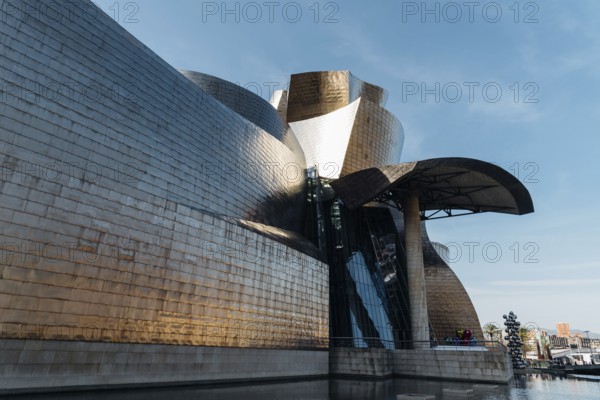 Bilbao, Spain, February 13, 2022: Exterior view of Guggenheim Museum designed built by Frank Gehry architect, Europe