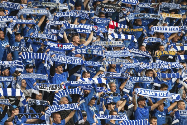 LUBIN, POLAND - AUGUST 6, 2023: Football match Polish PKO Ekstraklasa between KGHM Zaglebie Lubin vs Lech Poznan 1:1. Supporters of Lech with scarfs.