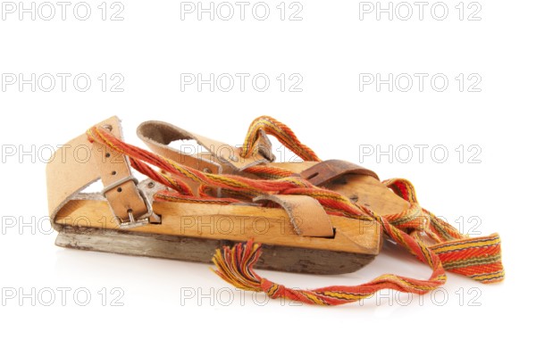 Dutch culture with skates in winter time isolated over white