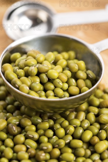 Mung beans over wooden spoon, lodz, poland