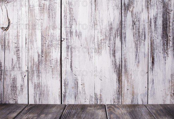 Old shabby white wooden wall and gray floor for design