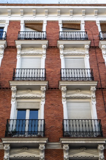 Old residential building in central Madrid. Real estate, renovation and maintenance concepts