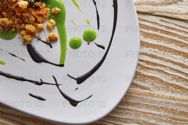 Molecular gastonomy cuttlefish roes with citrus mayonnaise