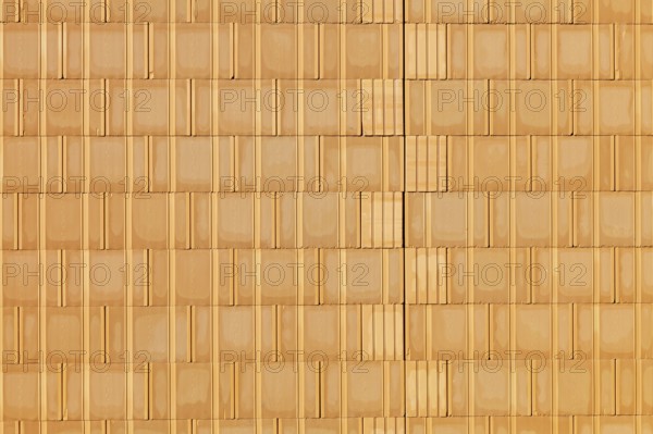 A new brick wall at a building shell house on a construction site. Background. Austria