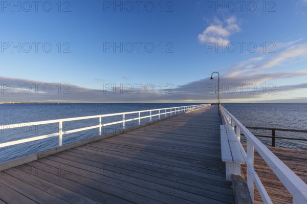 Kerford Rd Pier and Albert Park Yachting Angling Club in Albert Park at sunset on a winter's evening in Melbourne, Victoria, Australia, Oceania