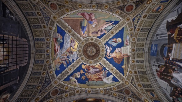 Ornate dome ceiling with frescoes of cherubs against a blue background, Raphael Rooms, Room of Heliodorus, Rome, Lazio, Italy, Europe