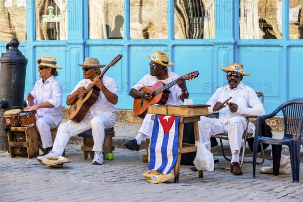 Cuba, the Caribbean, South America. Street musicians play in Austria, Central America