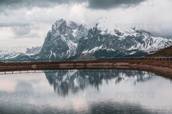 Water reservoir on the Seiser Alm in the Dolomites in South Tyrol, Italy, Europe