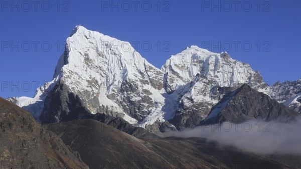 Snow covered mountains Cholatse and Tobuche, Nepal, Asia