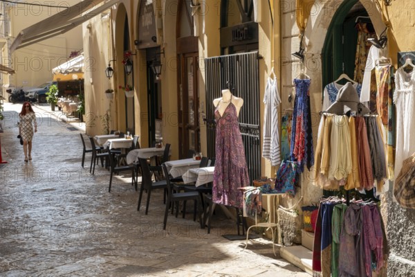 A shop selling clothes in Corfu Town on the Greek island of Corfu in the Ionian Sea, known for its pastel-colored Venetian architecture