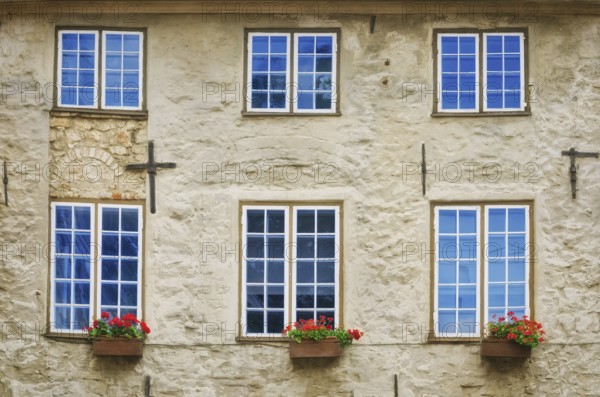 The facade of the old building with six windows in Riga, Latvia, Europe