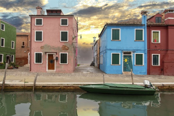 Colorful Houses in Burano beneath a scenic sky, Island of Venice, Italy, Europe