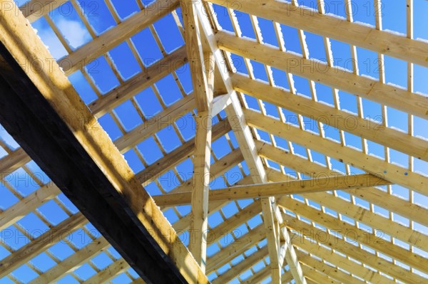 Roof construction made of wood, symbolic photo for home ownership, house construction and house financing Austria