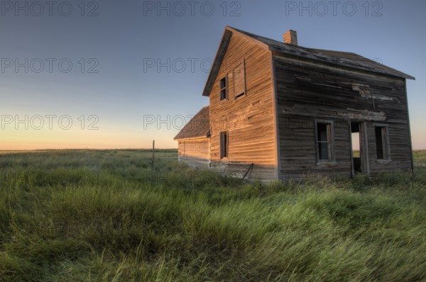 Abandoned Farmhouse Saskatchewan Canada sunset and prairie view