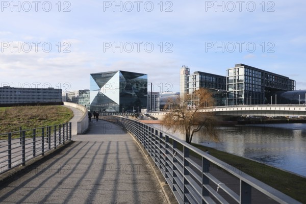 Berlin, Germany, February 12, 2022, view from the riverside promenade at the Spreebogenpark to the main station with Berlin Cube, Europe