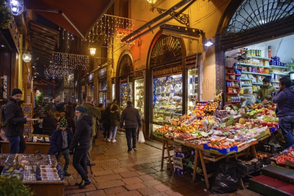 People walking on the street in the old town of Bologna, Italy, Europe