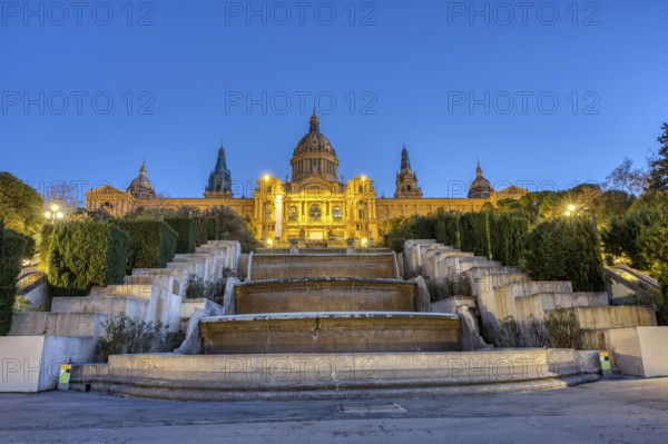 The National Palace on the Montjuic hill in Barcelona illuminated at dusk