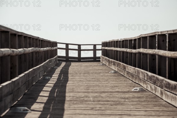 View on wooden elevated boardwalk for pedestrians at algar seco trail