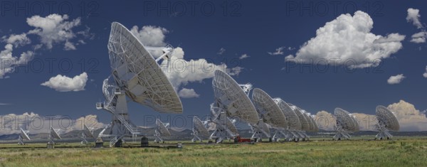 The VLA, very Large Array, Radio Telescope in Socorro, New Mexico An astronomical interferometer is an array of telescopes or mirror segments acting together to probe structures with higher resolution by means of interferometry