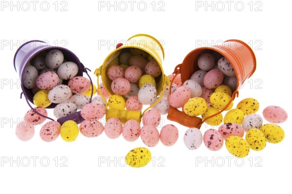 Colorful metal buckets with easter eggs