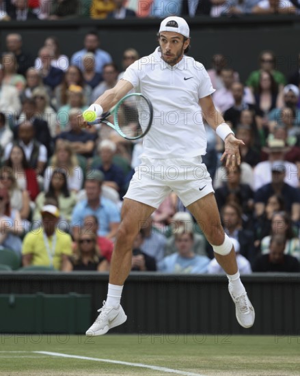 Italian tennis player Lorenzo Musetti in action at the 2024 Wimbledon Championships, London, England, United Kingdom, Europe