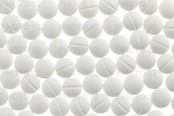 White tablets, symbolic photo for medicine, remedies and tablet addiction
