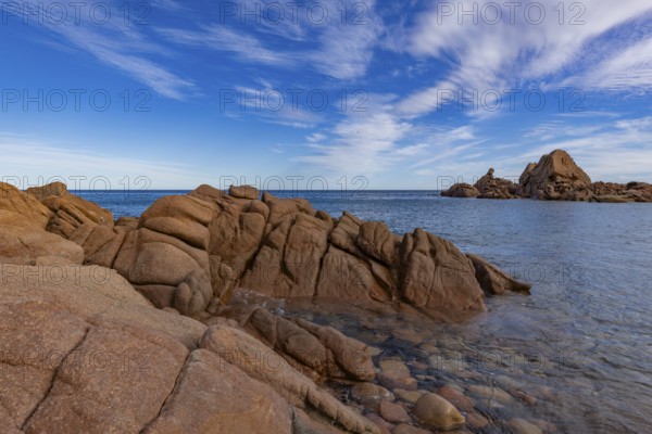 Coastal landscape with bizarre red rocks and sea view, Spiaggia di Cala E'Luas, Ogliastra, Sardinia, Italy, Europe