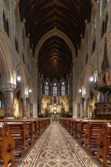 Cobh, Ireland, 15 August, 2022: vertical view of the central nave and altar inside the Cobh Cathedral, Europe