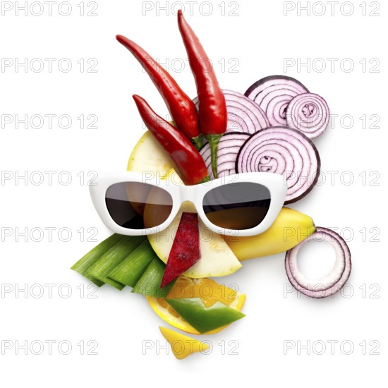 Quirky food concept of cubist style female face in sunglasses made of fruit and vegetables, on white