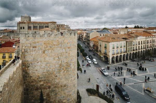 Avila, Spain, November 11, 2014: Cityscape of Avila from Medieval Walls a cloudy day. The old city and its extramural churches were declared a World Heritage site by UNESCO, Europe