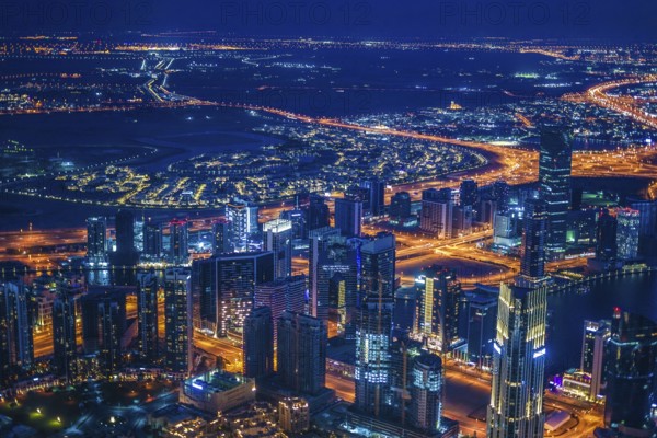 Dubai night view seen from the observation deck of Burj Khalifa. Shooting Location: Dubai
