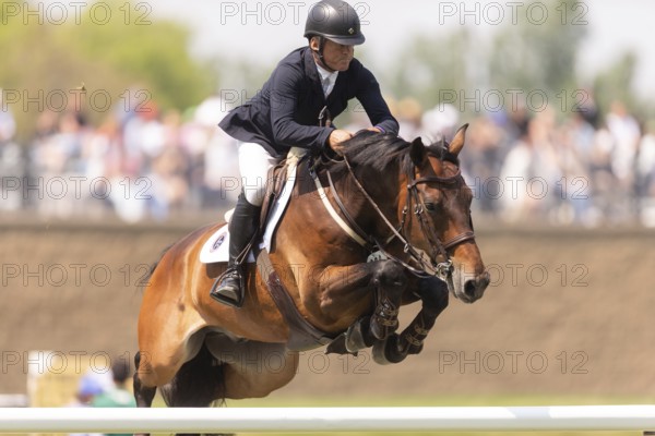 Will Simpson of the United States and riding Imar, compete in the 1.60m Grand Prix during The Continental international competition at Spruce Meadows, in Calgary, Canada, North America