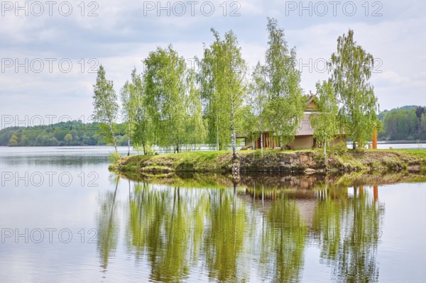 Small Island with a House among Birches in the Middle of the Daugava River, Latvia Plavinas, Latvia, Europe