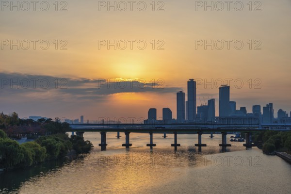 Seoul South Korea, sunrise city skyline of skyscraper at Yeouido and Han River