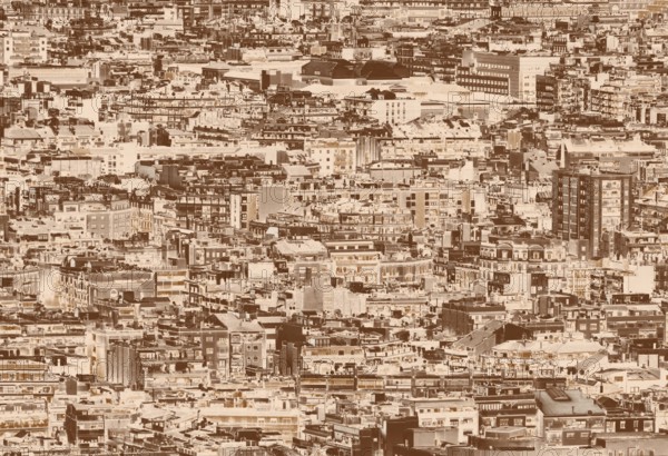 A sepia duotone crowded urban cityscape background with hundreds of densely packed buildings