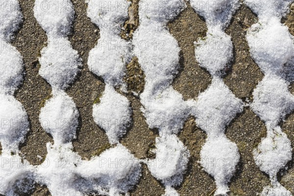 Wavy pattern after a snowfall as background