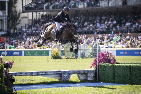 Sameh El Dahabn of Great Britain and riding WKD Toronto compete in the first round of the 1.60m CPKC International during the Spruce Meadows Masters, presented by Rolex, in Calgary, Alberta, Canada, North America