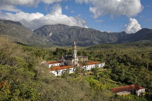 Aerial view of Sanctuary Caraca with mountains and blue sky in background, Minas Gerais, Brazil, South America