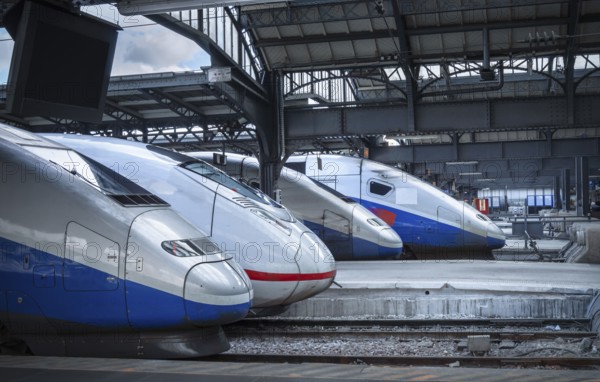 Four different types of high-speed modern trains, stationed in the train station from Paris, France, Europe