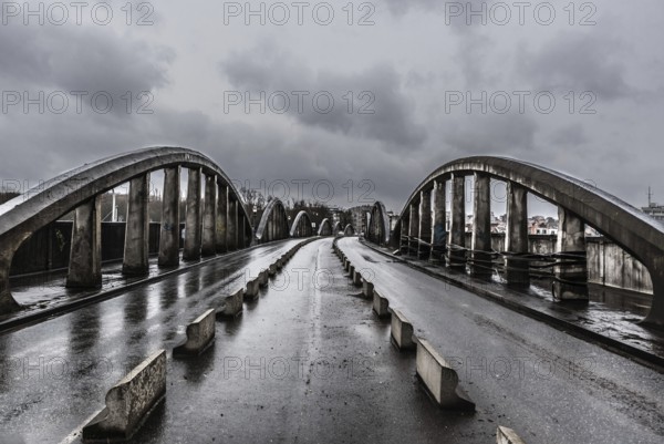 Brussels, Belgium, 03 28 2018: Old Industrial bridge called Leeuwoprit, Rampe du Lion, Albertbridge with bad weather comming, Europe