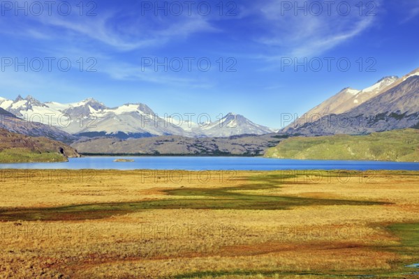 National Park Perito Moreno in Patagonia, Argentina. The blue lake in a picturesque valley surrounded by snow-capped mountains