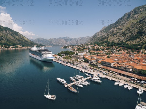 Top view of the pier with a big boat and town. Drone photo