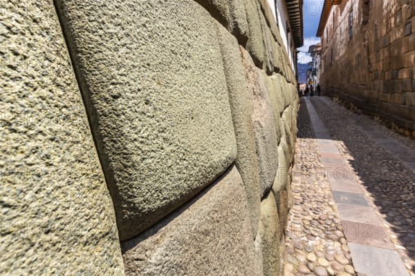 Twelve angles stone, Beautiful narrow street and buildings wall in centre of Cusco or Cuzco city, Peru. South America
