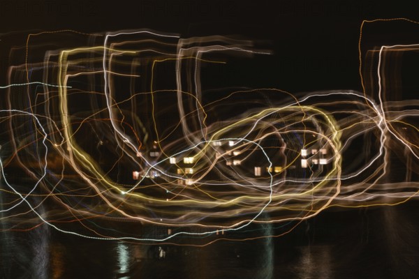 Light painting, light trails and reflections at night - long exposure