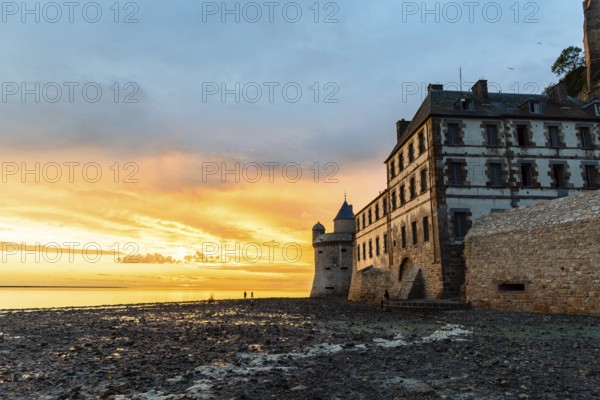 Dramatic sunset on Mont Saint Michel, Normandy, France, Europe