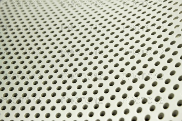 Periodic structures. Relief surface of the plastic surface with circular holes
