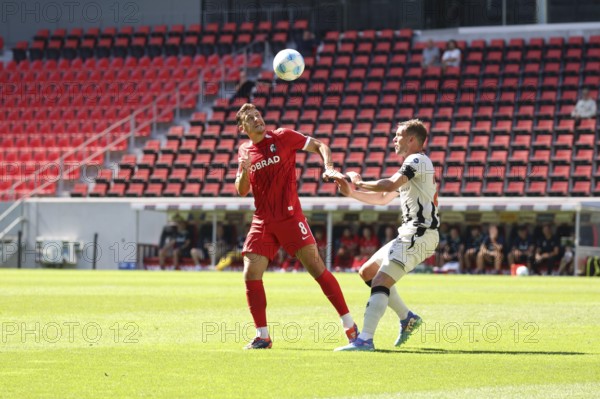 Maximilian Eggestein (SC Freiburg) wins the header duel against Fabian Frei (FC Basel) during the football test match: SC Freiburg - FC Basel REGULATIONS PROHIBIT ANY USE OF PHOTOGRAPHS AS IMAGE SEQUENCES AND/OR QUASI-VIDEONan Photo: Joachim Hahne/johapress, Freiburg, Germany / Germany