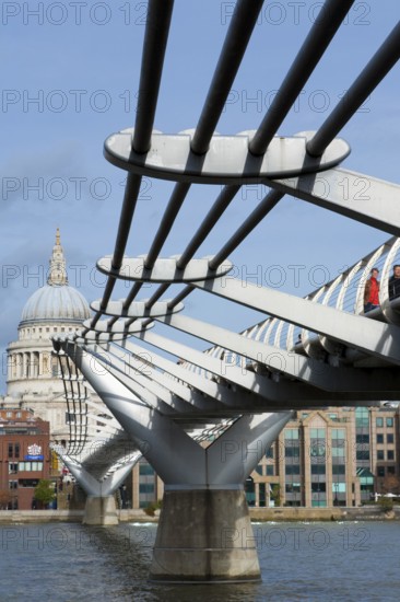Pedestrians crossing Millennium Bridge over the River Thames, St. Paul's Cathedral, London, England, United Kingdom, Europe